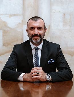 H. TOLGA TOSUN